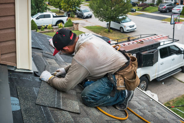 Professional Roofing technician working in Linden, TN